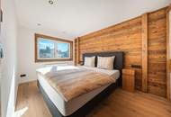 Sanierte Perle mit alpinem Flair: Exklusive 2-Zimmer-Wohnung