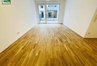 Ruhige Wohnung mit Terrasse und Garten in moderner Neubauanlage inkl. Garagenplatz - Befristet vermietet - Für Anleger und Eigennutzer!