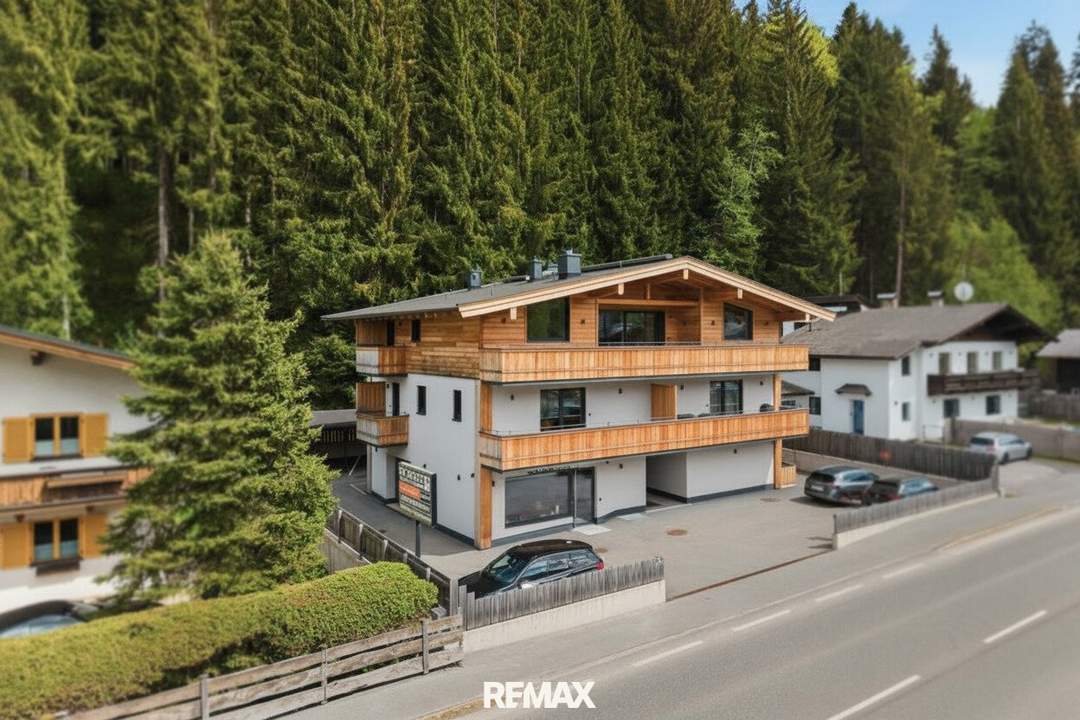 Mit dem Lift direkt in Ihr neues exklusives Penthouse mit Glaskamin und Traum Ausblick in Aurach bei Kitzbühel -