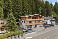 Mit dem Lift direkt in Ihr neues exklusives Penthouse mit Glaskamin und Traum Ausblick in Aurach bei Kitzbühel -