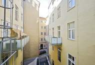 Altbau mit Südbalkon | 2-Zimmer in ruhiger Innenhoflage | Einbauküche | Lift | Kellerabteil