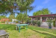 Entzückendes Zweifamilienhaus mit Pool, traumhaftem Garten und Garage in toller Lage in Tribuswinkel zu kaufen!
