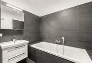 Moderne 100 m² Kohlbacher Neubauwohnung mit Balkon und TG-Platz (barrierefrei)