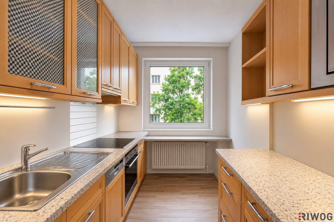 Neubauwohnung mit Grünblick und 4-Zimmer Möglichkeit in einem gepflegten Haus