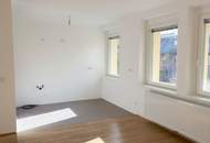 Sonnige, teilsanierte 2-Zimmer-Wohnung mit traumhaftem Grünblick!