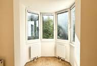 Traumblick in Gartenlandschaft! Südseitiger 2-Zimmer-Neubau mit charmantem Erker! Garagenoption!