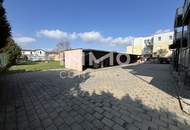 Miethaus mit 9 Wohnungen, Gemeinschaftsgarten und Carports