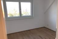 Moderne Anlegerwohnung mit Loggia und Tiefgaragenplatz