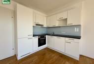 Attraktive 4-Zimmer-Wohnung mit großzügigem Wohnkonzept und ca. 12m² großem sonnigem Balkon