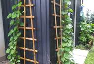 "Kaminfeuer trifft Gartentraum: Topmoderne Gartenwohnung im Wienerwald"