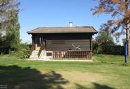 Urbanes Wohnen mit großem Garten mit kleinem Einfamilienhaus in Essling