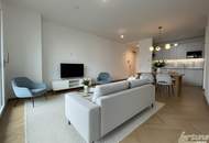 Exklusive 3-Zimmer-Neubauwohnung mit Balkon, Smart-Steuerung, Pool im Garten & Tiefgarage