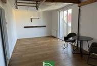 Schöne DG-Wohnung in ruhiger Lage mit hochwertiger Küche & langem Balkon