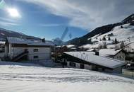 Hohe Baumassendichte: Zentrumsnahes Grundstück mit Altbestand und direkter Pistenanbindung