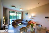 Moderne 3 Zimmerwohnung mit Eigengarten und großem Outdoor-Pool!