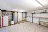 Einfamilienhaus mit Einliegerwohnung, Garage, Carports und Ausblick!
