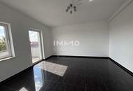 Miethaus mit 9 Wohnungen, Gemeinschaftsgarten und Carports