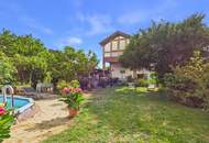 Entzückendes Zweifamilienhaus mit Pool, traumhaftem Garten und Garage in toller Lage in Tribuswinkel zu kaufen!