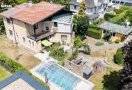 Einfamilienhaus mit Salzwasserpool, Wintergarten, Garage und zwei Carports