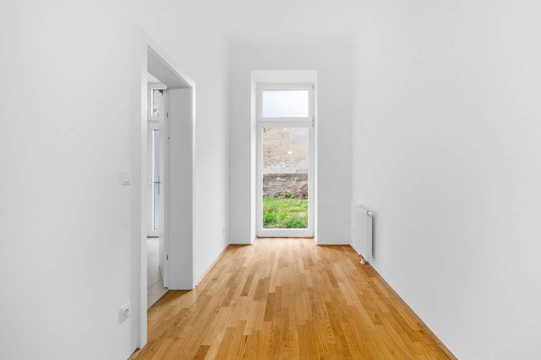 “Charmante 2-Zimmer-Wohnung mit Terrasse und Garten in Favoriten“