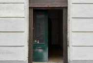 Charme mit Entwicklungspotenzial 1-Zimmer-Wohnung in zentraler Lage