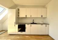 Großzügige Dachgeschosswohnung mit sonnigem Balkon - Klimaanlage - Erstbezug