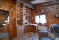 „Wohnen im Einklang mit der Natur – Stilvolles Holzhaus in traumhafter Ruhelage auf unverbaubarem Grundstück“