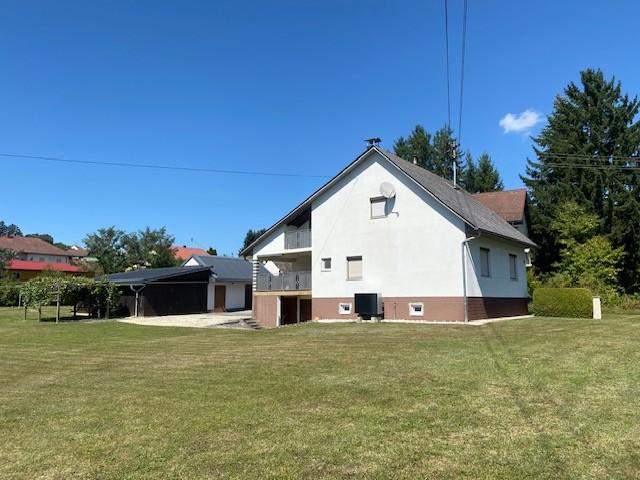Einfamilienhaus mit Grünblick & großem Grundstück