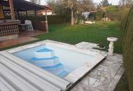 Seltene Gelegenheit! Schönes Holzhaus auf eigenem Gartengrundstück im Eigentum!