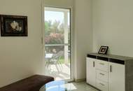 Miete. Neuwertige Wohnung mit Terrasse und Garten in Seeboden. Tiefgarage.
