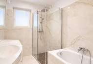 Stilvolle 3-Zimmer-Neubauwohnung in absoluter Ruhelage mit Innenhof-Garten & optionalem Parkplatz