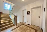 Moderner Wohntraum mit Wintergarten und Pool