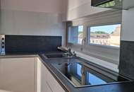 "Bisambergblick: Exklusives Dachgeschoss-Terrassen-Penthouse"