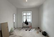 RUHIGES INNENHOF-ALTBAUJUWEL NÄHE MILLENNIUM CITY – ERSTBEZUG NACH DESIGN-SANIERUNG