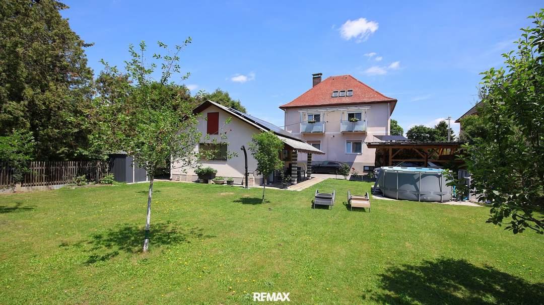 Mehrfamilienhaus mit Pool, Garage und Garten zu verkaufen