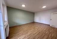 Starterwohnung im Zentrum mit Garten und Tiefgaragenstellplatz!