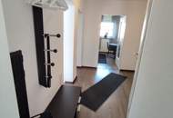 Hochwertig renovierte 2‑Zimmer Wohnung mit Balkon