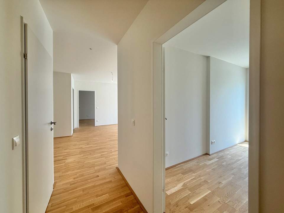Neubau Erstbezug I Nähe Donau I Fußbodenheizung I Balkon I Tiefgarage I Fernwärme I