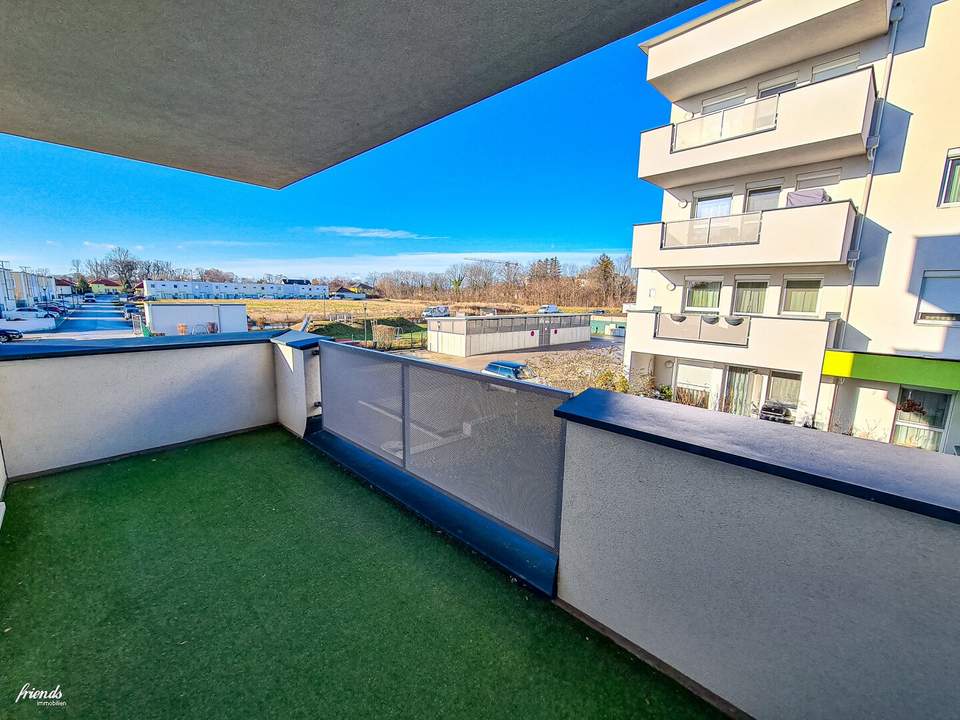 Fernwärme - Neubauwohnung mit 10m2 Balkon, Parkplatz und Grünblick