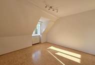 Tolle Eigentumswohnung im Dachgeschoß in sehr guter Lage mit einem eigenen Parkplatz