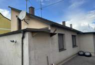 Einfamilienhaus mit sonnigem Grund