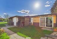 Charmantes Einfamilienhaus mit großzügigem Garten, 2 Garagen und viel Potenzial