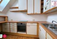 Helle Dachgeschoss-Maisonette mit zwei traumhaften Terrassen und Tiefgaragenplatz