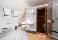 "Familienfreundliches Einfamilienhaus mit Wellnessbad, Sauna, Kachelofen, Fußbodenheizung, großem Garten und Doppelgarage in Tulln"