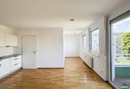 Schöne 1-Zimmer-Wohnung mit Balkon direkt an der Donau