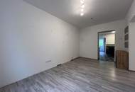 Moderne, sanierte 3-Zimmer-Eigentumswohnung mit Gartenanteil und Garage