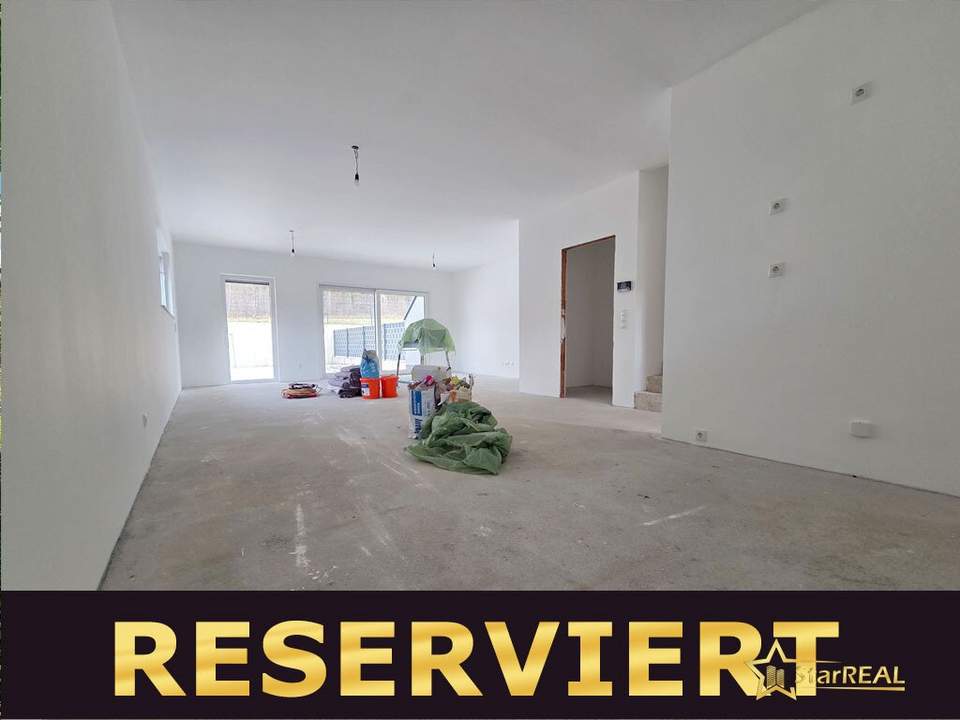 RESERVIERT! 208 m² NFL! 5-ZIMMER, KELLER, BALKON, TERRASSE, CARPORT UND GROSSER GARTEN. ZIEGELQUALITÄT MIT UNVERBAUBAREM GRÜNBLICK.