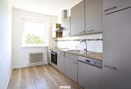 Schöne Erdgeschoss 3-Raum-Wohnung mit Balkon und PKW-Abstellplatz