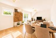 EXKLUSIVES WOHNEN AN DER DONAU IM GRÜNEN: traumhafter Blick I großzügiger Balkon I moderne & hochwertige Einbauküche I Fußbodenheizung & Raffstores