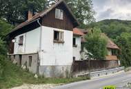 7,6 % Rendite – vermietete Doppelhaushälfte mit zusätzlicher Wohneinheit zur Renovierung und Selbstnutzung.